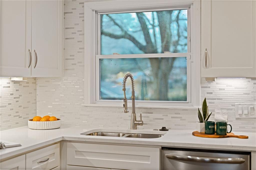 2226 Alpha Drive Decatur, GA 30032 - Photo 5 of 36 a kitchen with a sink and cabinets