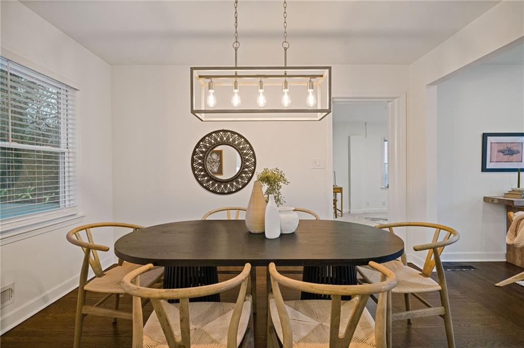 2226 Alpha Drive Decatur, GA 30032 - Photo 8 of 36 a view of a dining room with furniture and wooden floor