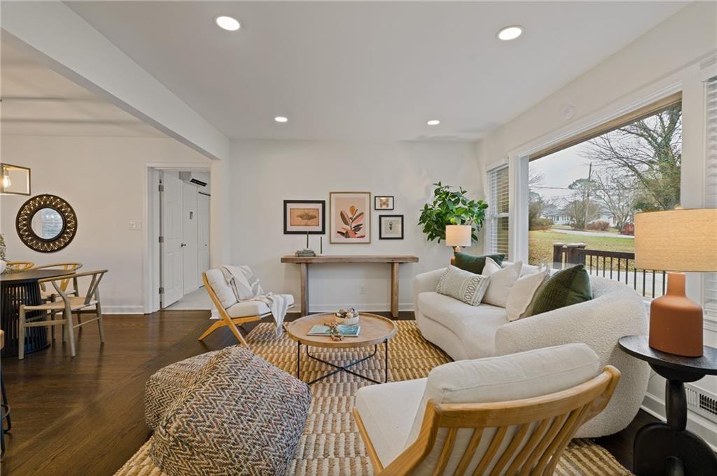 2226 Alpha Drive Decatur, GA 30032 - Photo 10 of 36 a living room with furniture a rug potted plant and a large window