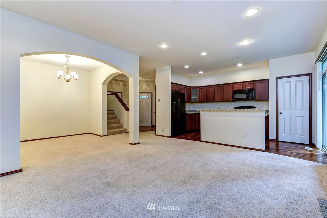 1031 215th Place Southeast Bothell, WA 98021 - Photo 6 of 25 a view of a kitchen with a sink