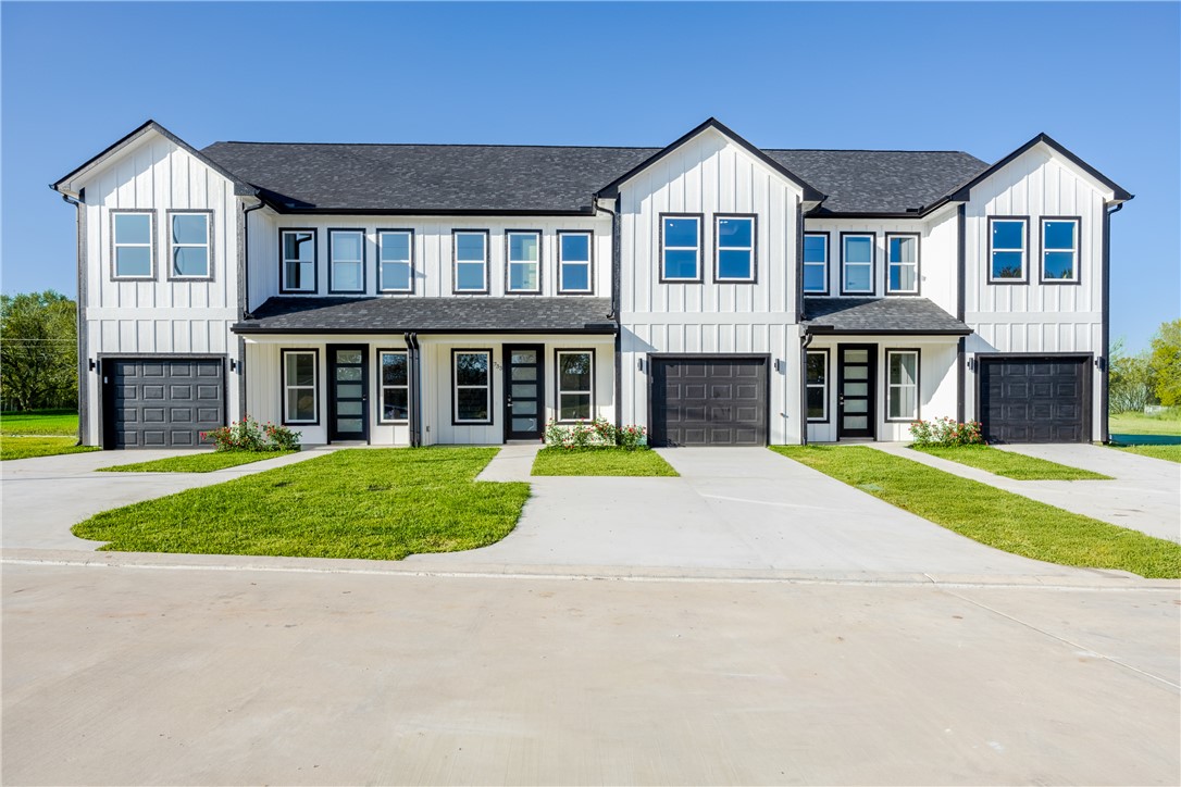 729 Ebenezer Lane Brenham, TX 77833 - Photo 25 of 25 a front view of a house with a garden
