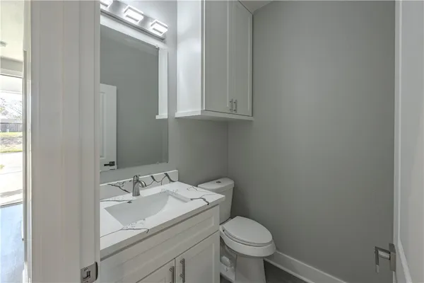 a bathroom with a sink and a toilet