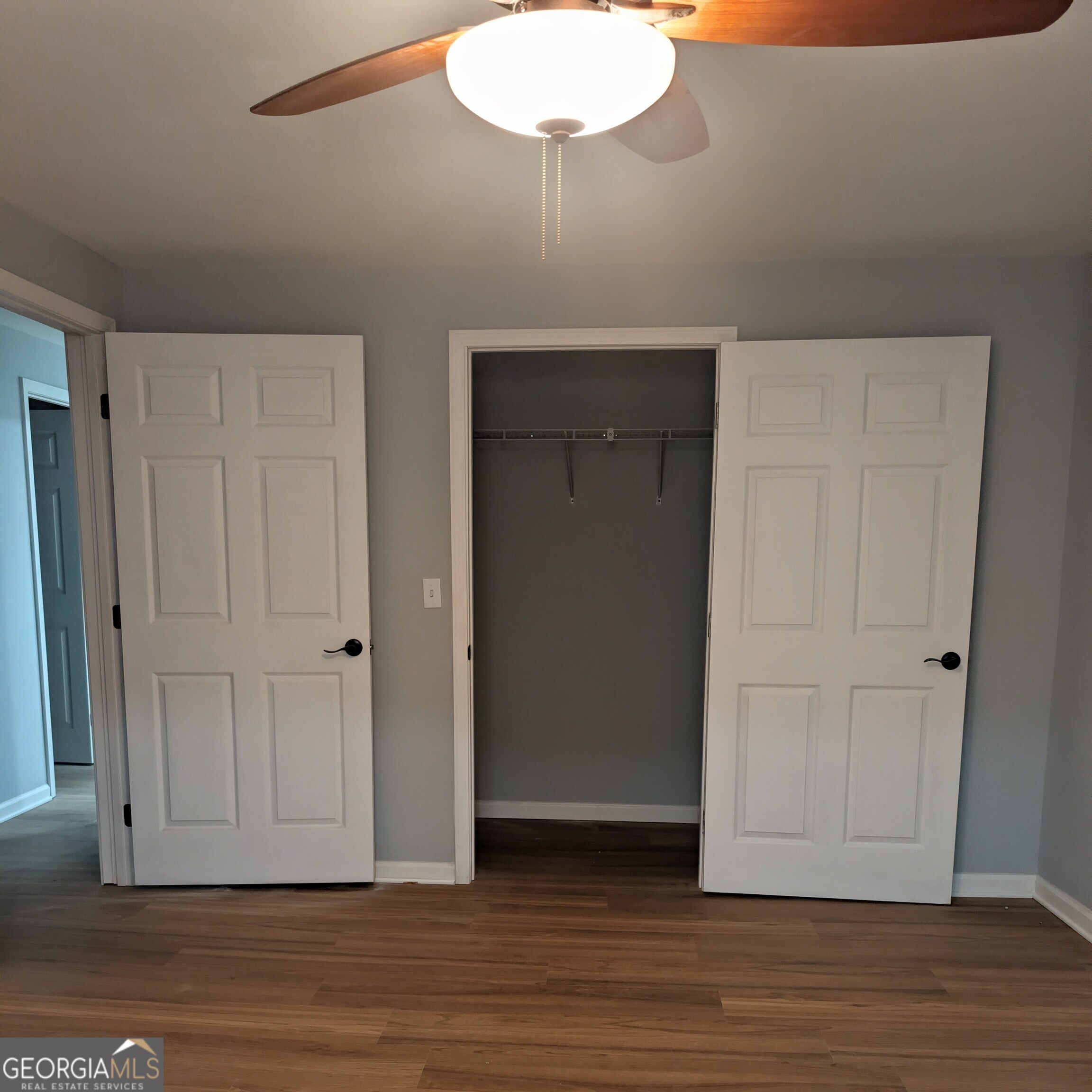 481 West Currahee Street Toccoa, GA 30577 - Photo 11 of 26 a view of empty room with wooden floor