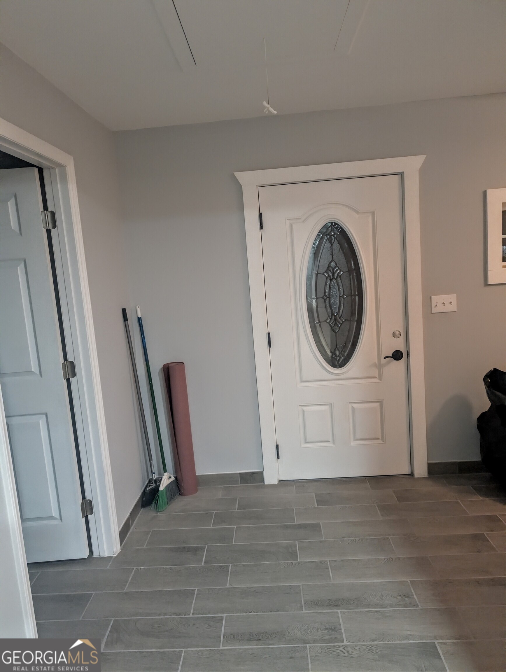481 West Currahee Street Toccoa, GA 30577 - Photo 20 of 26 a view of a storage & utility room with a washing machine
