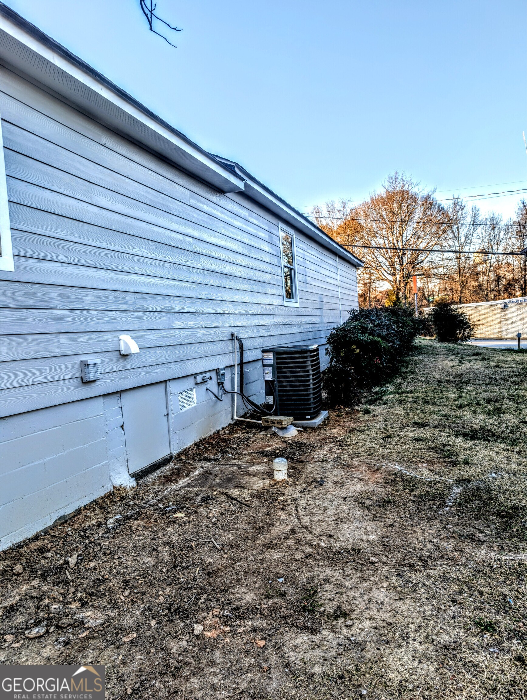 481 West Currahee Street Toccoa, GA 30577 - Photo 26 of 26 a view of a house with a yard