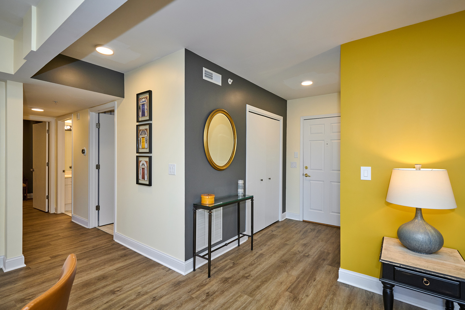 740 Creekside Drive, Unit 510 Mount Prospect, IL 60056 - Photo 16 of 48 a living room with wooden floor and a table