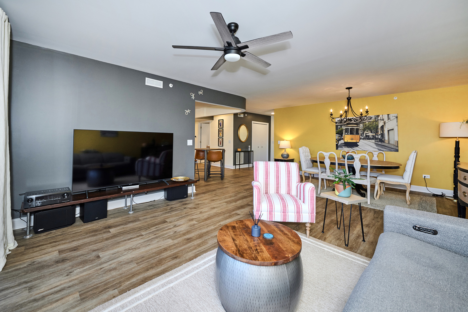 740 Creekside Drive, Unit 510 Mount Prospect, IL 60056 - Photo 2 of 48 a living room with furniture and a flat screen tv