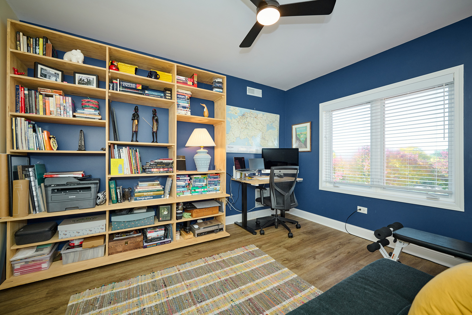 740 Creekside Drive, Unit 510 Mount Prospect, IL 60056 - Photo 34 of 48 a view of a workspace with furniture and a bookshelf