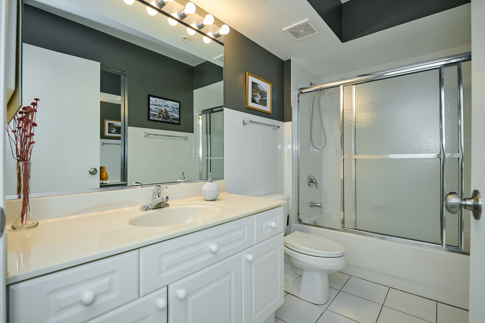 740 Creekside Drive, Unit 510 Mount Prospect, IL 60056 - Photo 37 of 48 a bathroom with a sink toilet and shower