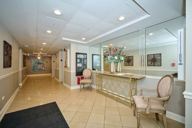 a very nice looking dining room with a large window