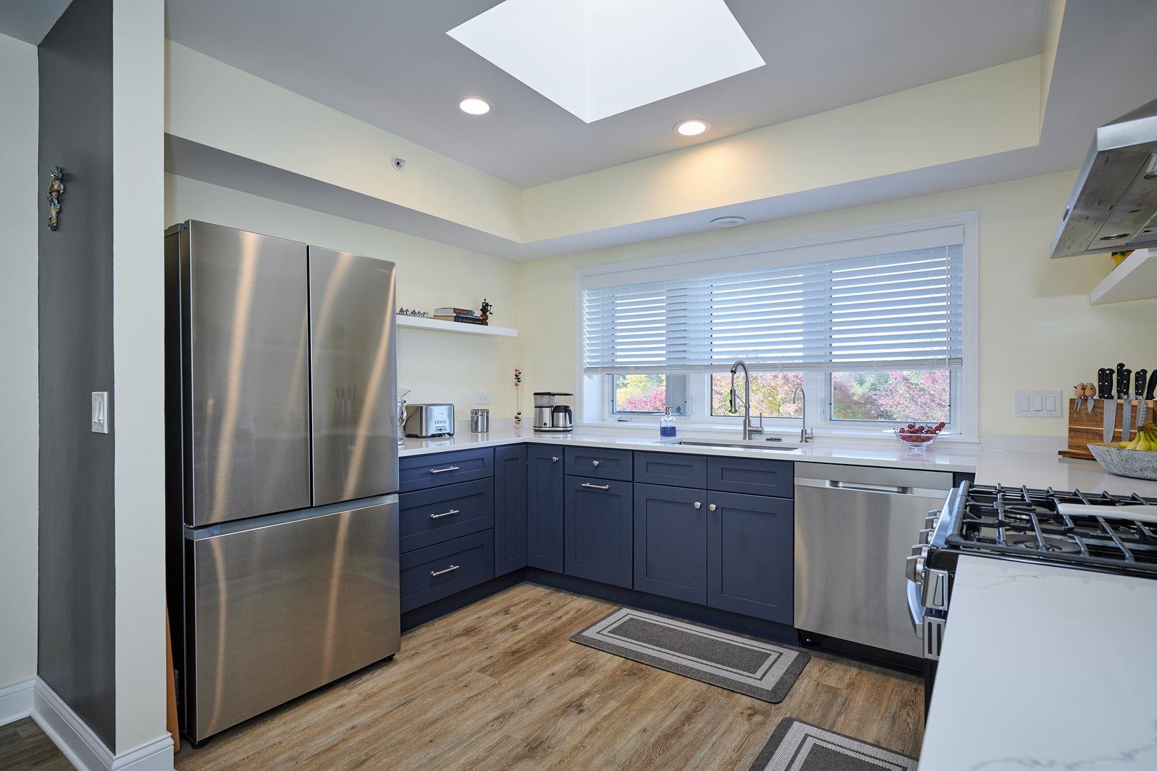 740 Creekside Drive, Unit 510 Mount Prospect, IL 60056 - Photo 10 of 48 a kitchen with stainless steel appliances granite countertop a refrigerator a sink dishwasher a stove with wooden cabinets and floor