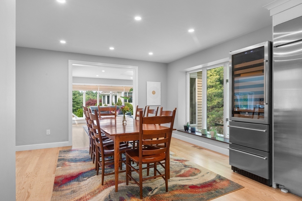 4 The Fairways Ipswich, MA 01938 - Photo 15 of 40 a view of a dining room with furniture window and wooden floor