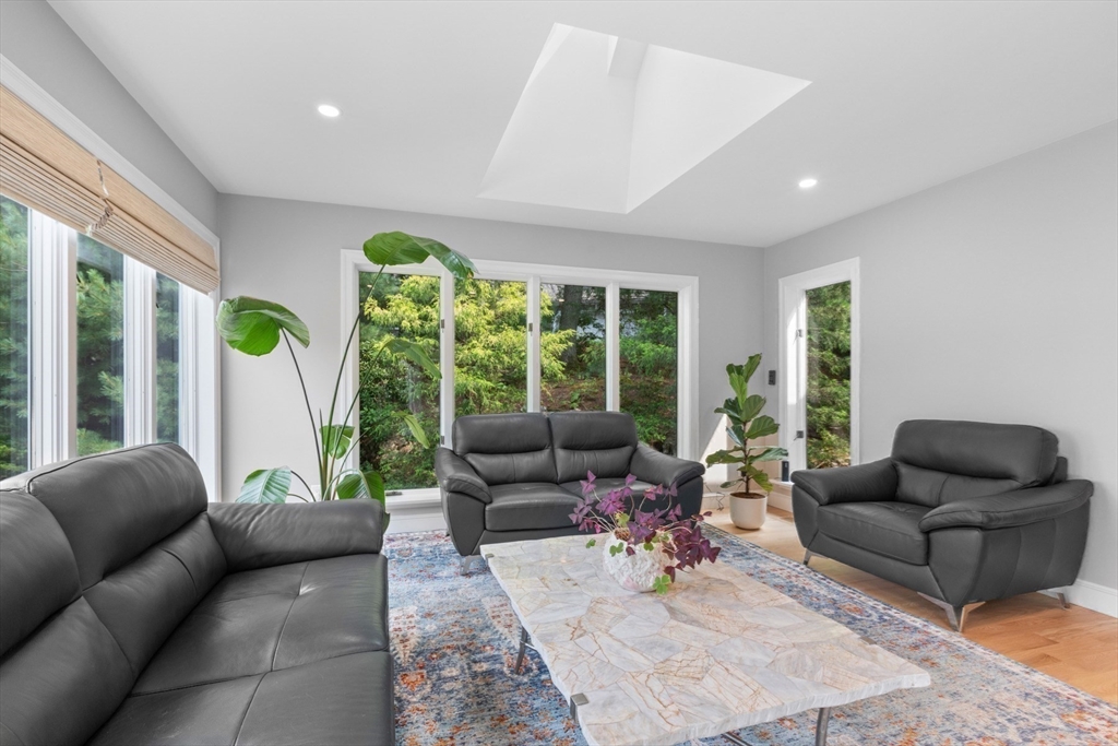 4 The Fairways Ipswich, MA 01938 - Photo 17 of 40 a living room with furniture and a large window