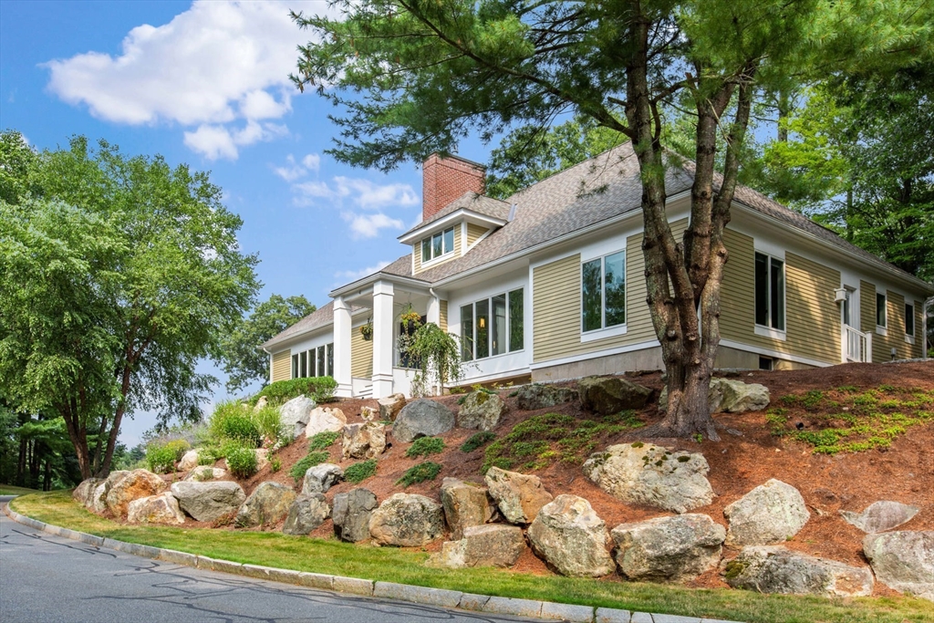 4 The Fairways Ipswich, MA 01938 - Photo 2 of 40 a front view of a house with garden