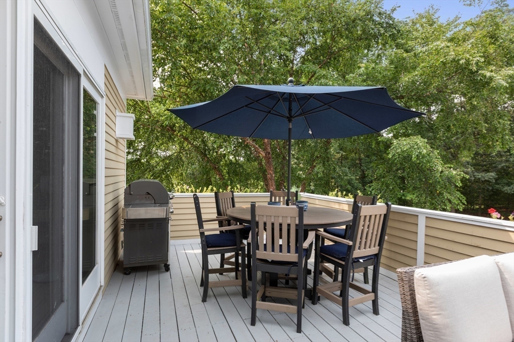 4 The Fairways Ipswich, MA 01938 - Photo 30 of 40 a view of backyard with seating space and deck