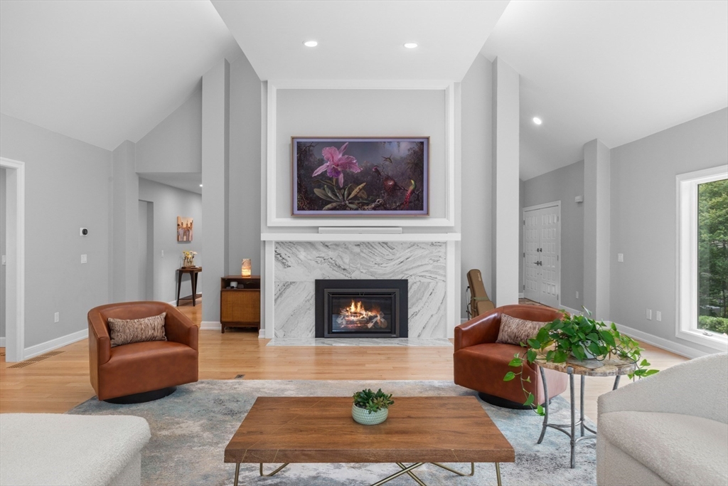 4 The Fairways Ipswich, MA 01938 - Photo 8 of 40 a living room with furniture and a fireplace