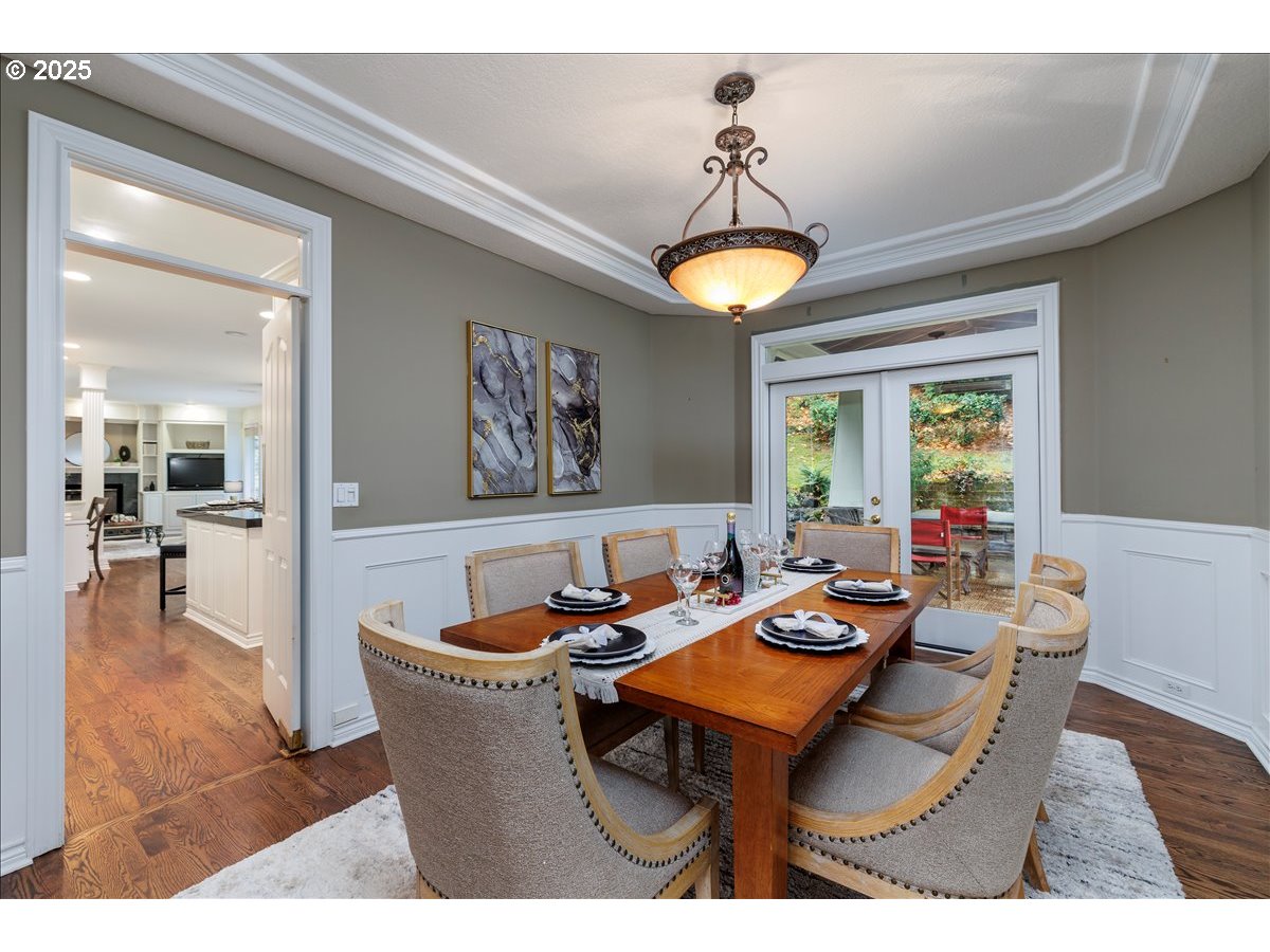 15540 Southwest Baker Lane Portland, OR 97224 - Photo 11 of 43 a living room with furniture and a chandelier