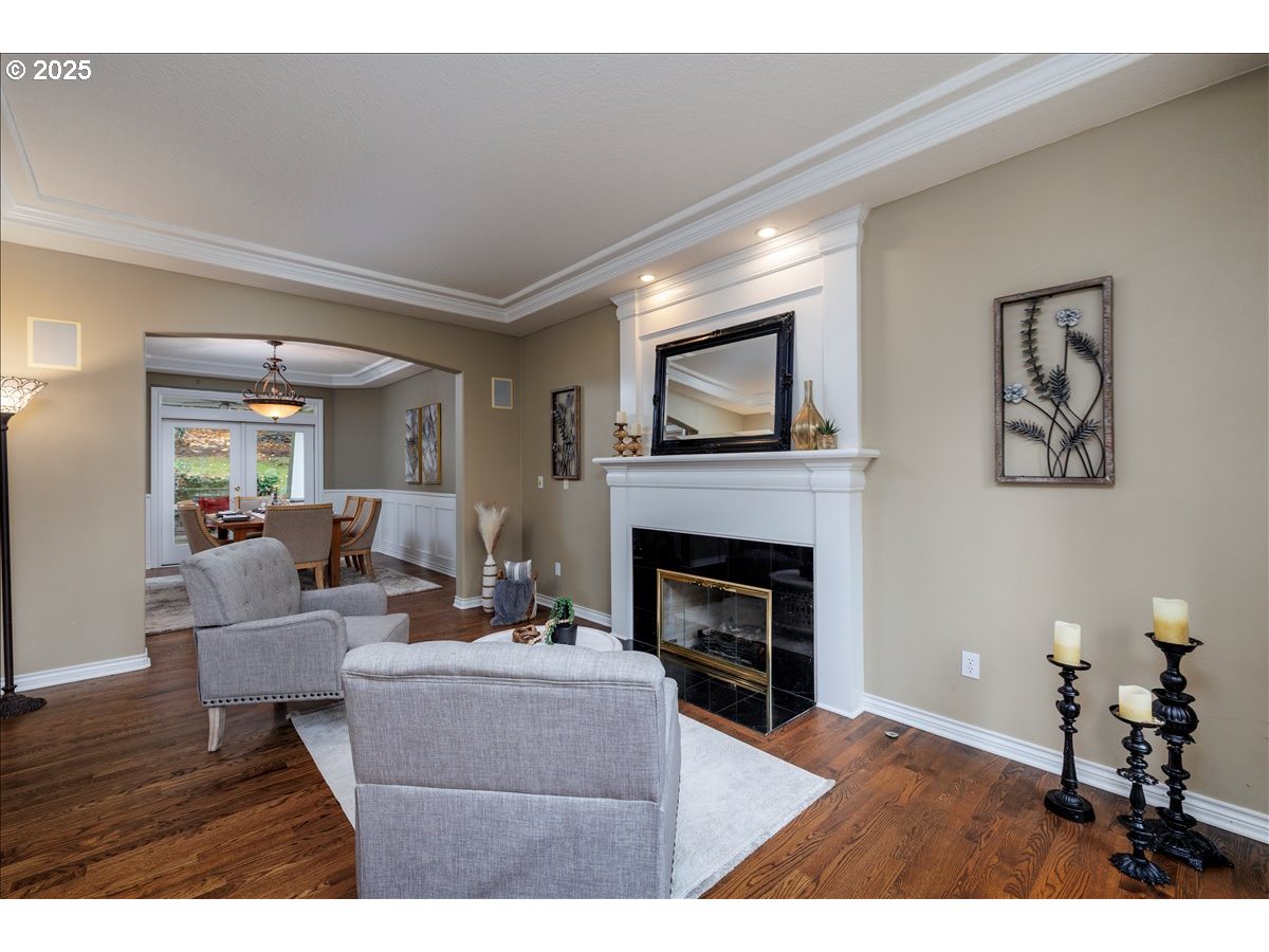 15540 Southwest Baker Lane Portland, OR 97224 - Photo 14 of 43 a living room with furniture and a fireplace