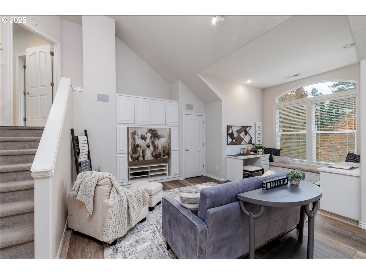 15540 Southwest Baker Lane Portland, OR 97224 - Photo 24 of 43 a living room with furniture and a large window