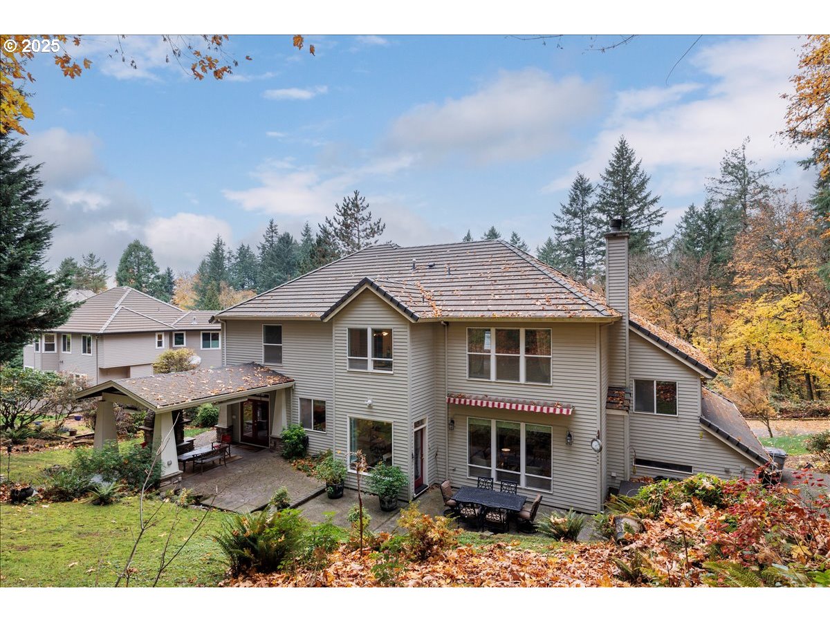15540 Southwest Baker Lane Portland, OR 97224 - Photo 36 of 43 a view of a house with backyard and sitting area