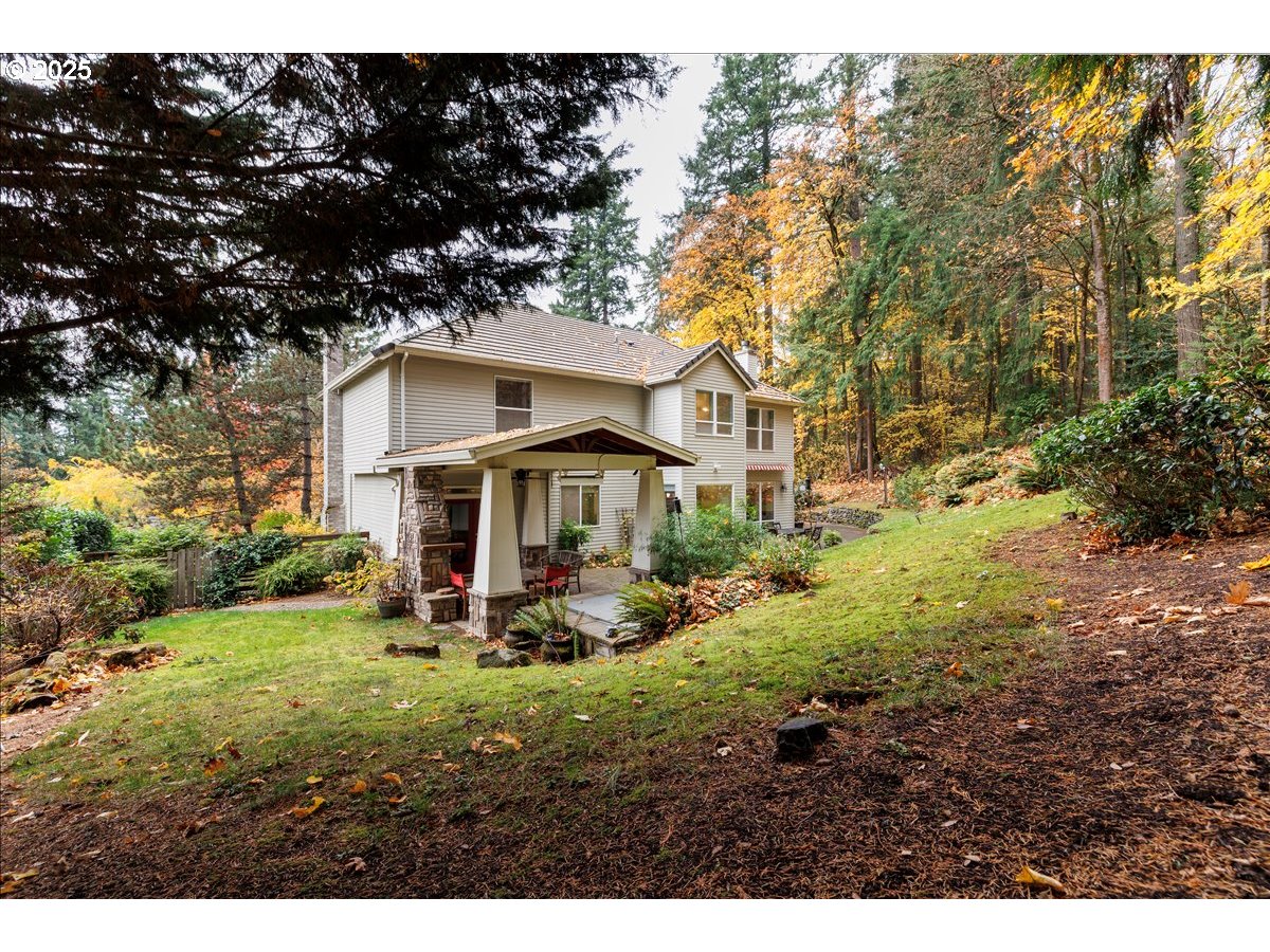 15540 Southwest Baker Lane Portland, OR 97224 - Photo 37 of 43 a view of a house with yard and sitting area