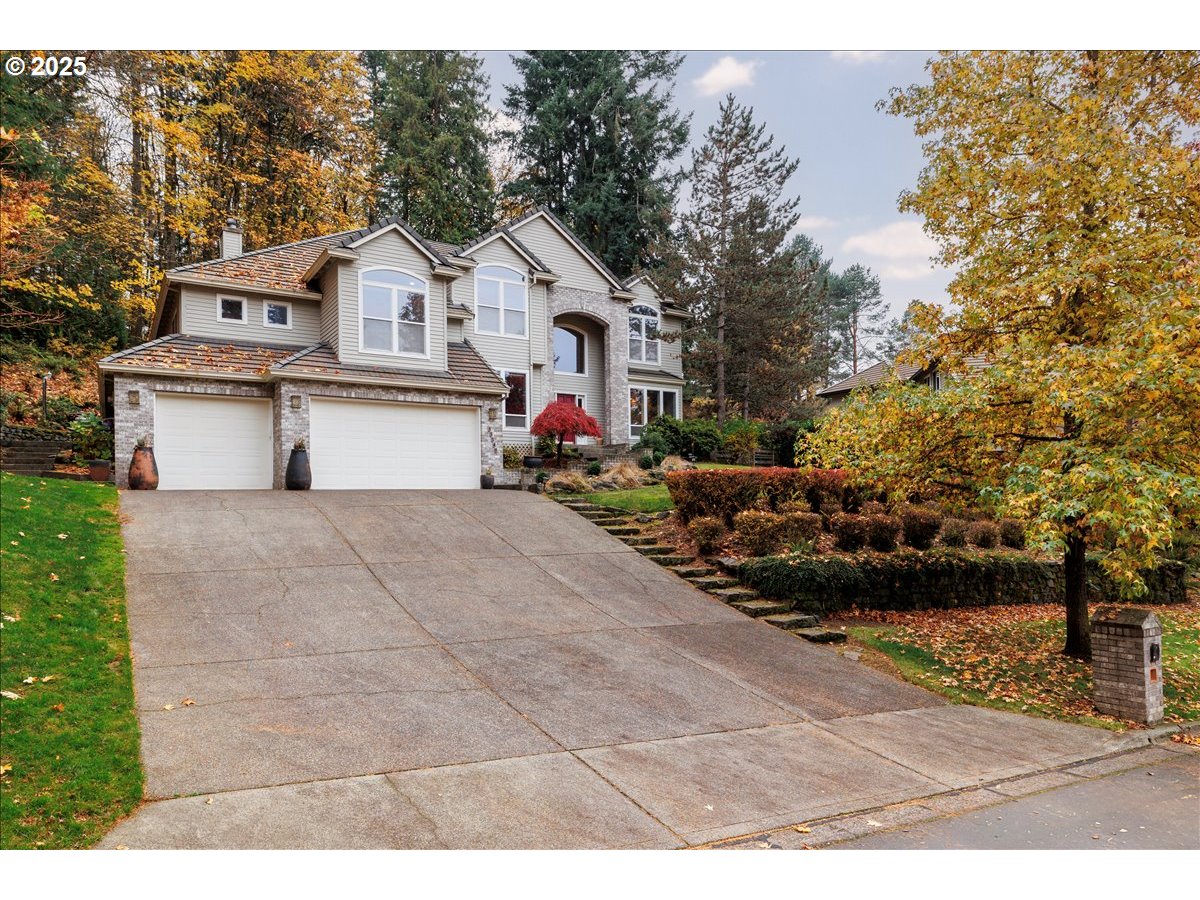 15540 Southwest Baker Lane Portland, OR 97224 - Photo 42 of 43 a view of a white house with a outdoor space