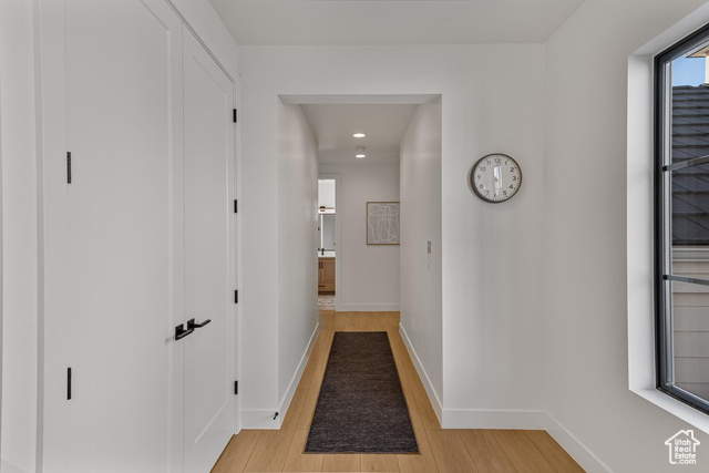 5367 Cyan Lane St. George, UT 84790 - Photo 11 of 36 Hallway featuring light wood-style flooring, baseboards, and recessed lighting