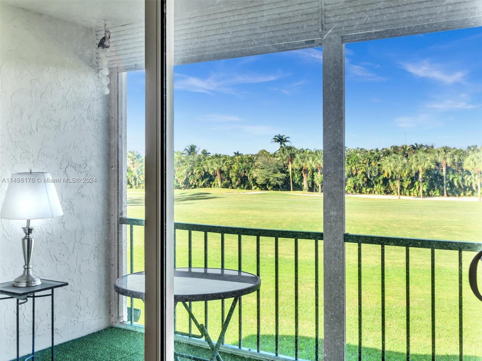 9411 North Hollybrook Lake Drive, Unit 209 Pembroke Pines, FL 33025 - Photo 15 of 36 a view of a room with a large window