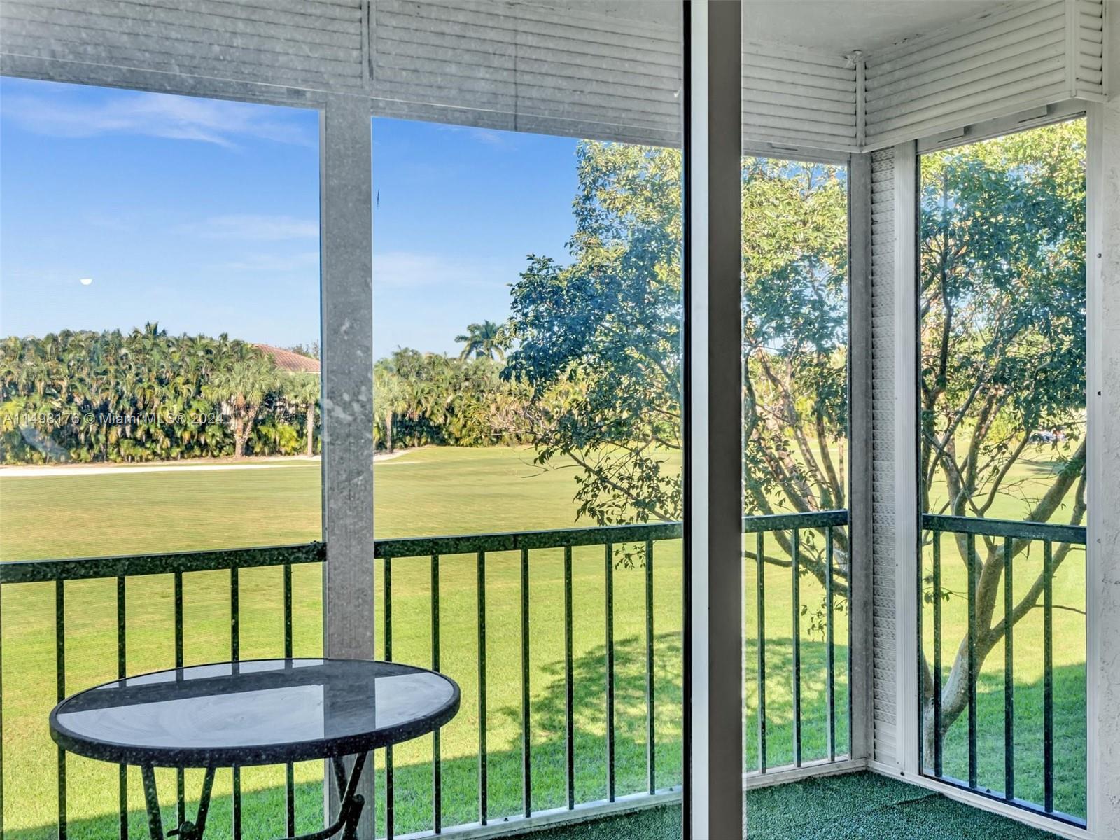 9411 North Hollybrook Lake Drive, Unit 209 Pembroke Pines, FL 33025 - Photo 16 of 36 a view of a city from a balcony