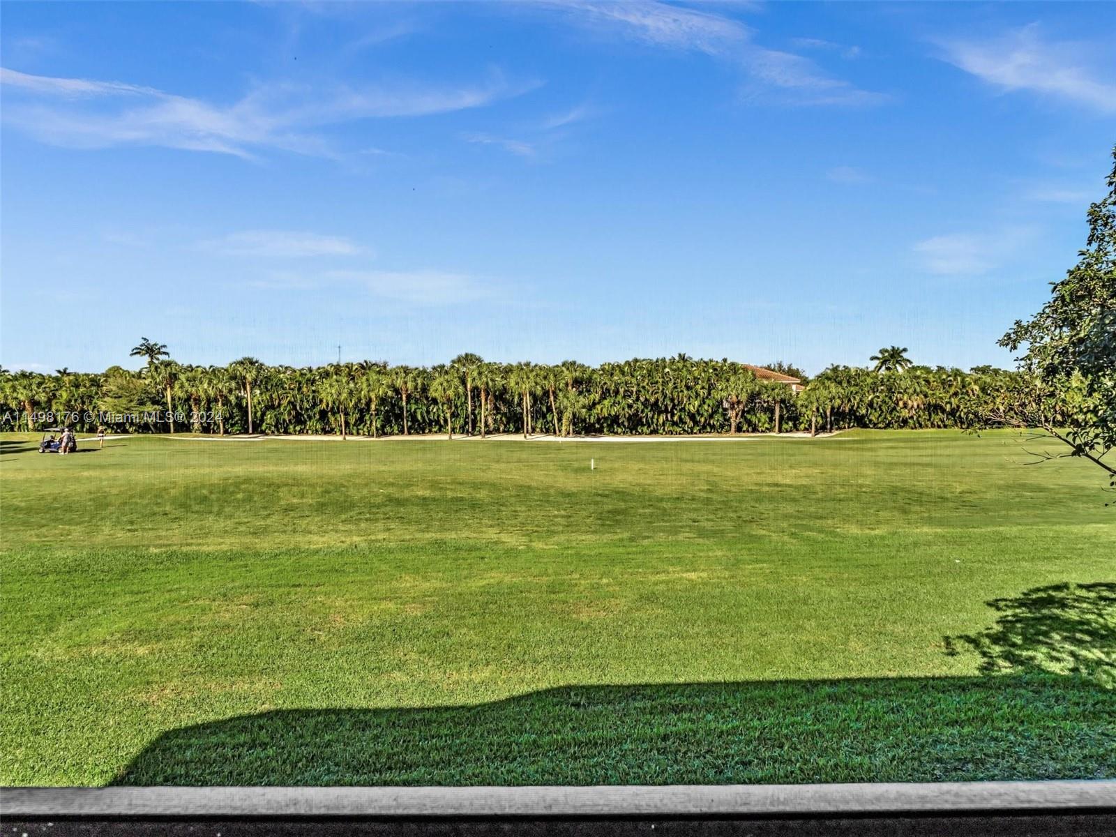 9411 North Hollybrook Lake Drive, Unit 209 Pembroke Pines, FL 33025 - Photo 18 of 36 a view of an ocean from a yard