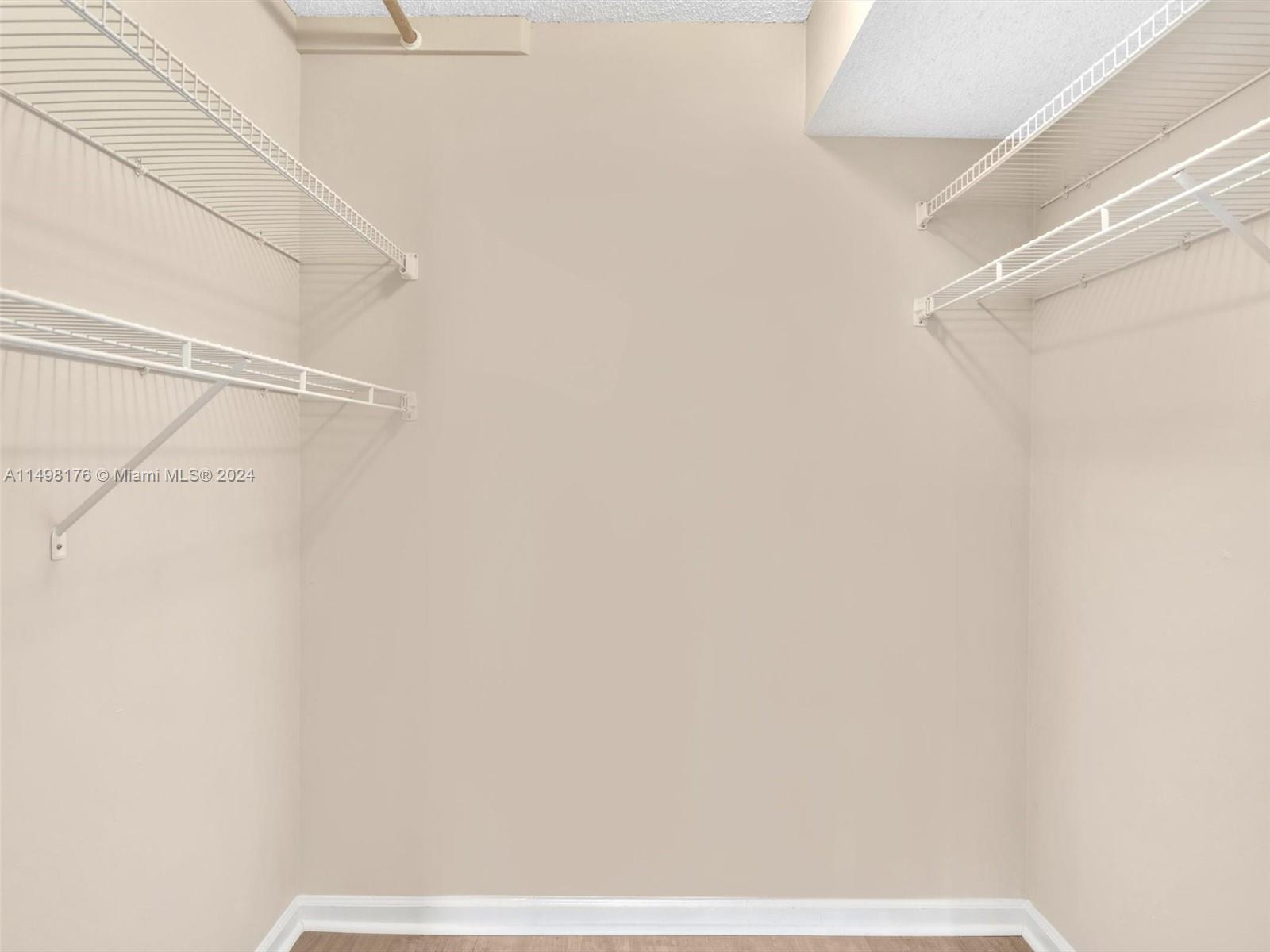 9411 North Hollybrook Lake Drive, Unit 209 Pembroke Pines, FL 33025 - Photo 26 of 36 a view of small space with racks on the wall