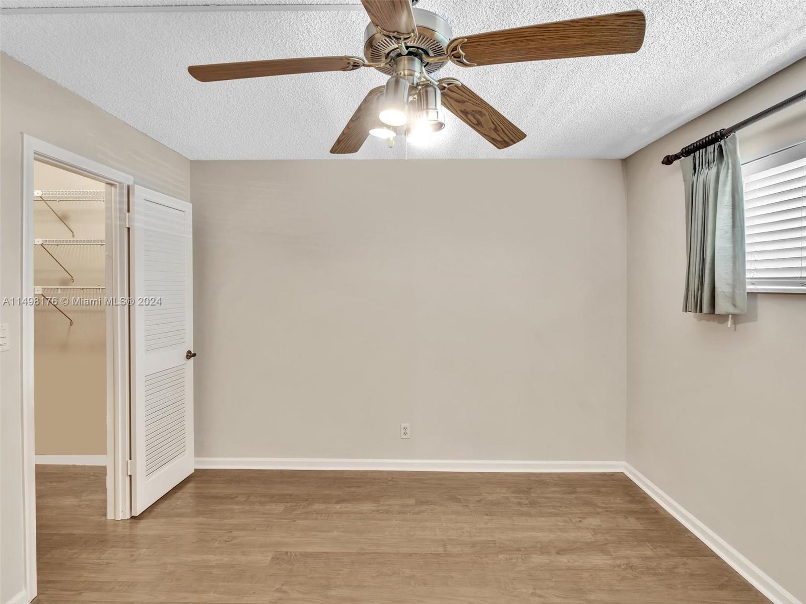 9411 North Hollybrook Lake Drive, Unit 209 Pembroke Pines, FL 33025 - Photo 30 of 36 a view of an empty room