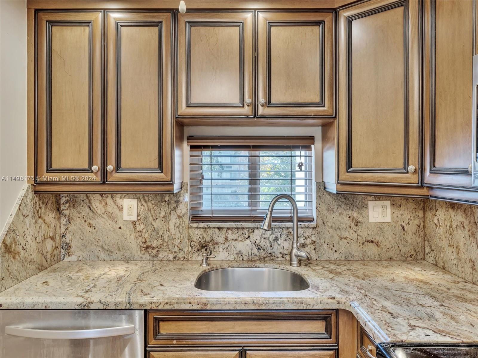 9411 North Hollybrook Lake Drive, Unit 209 Pembroke Pines, FL 33025 - Photo 7 of 36 a view of a sink and a mirror