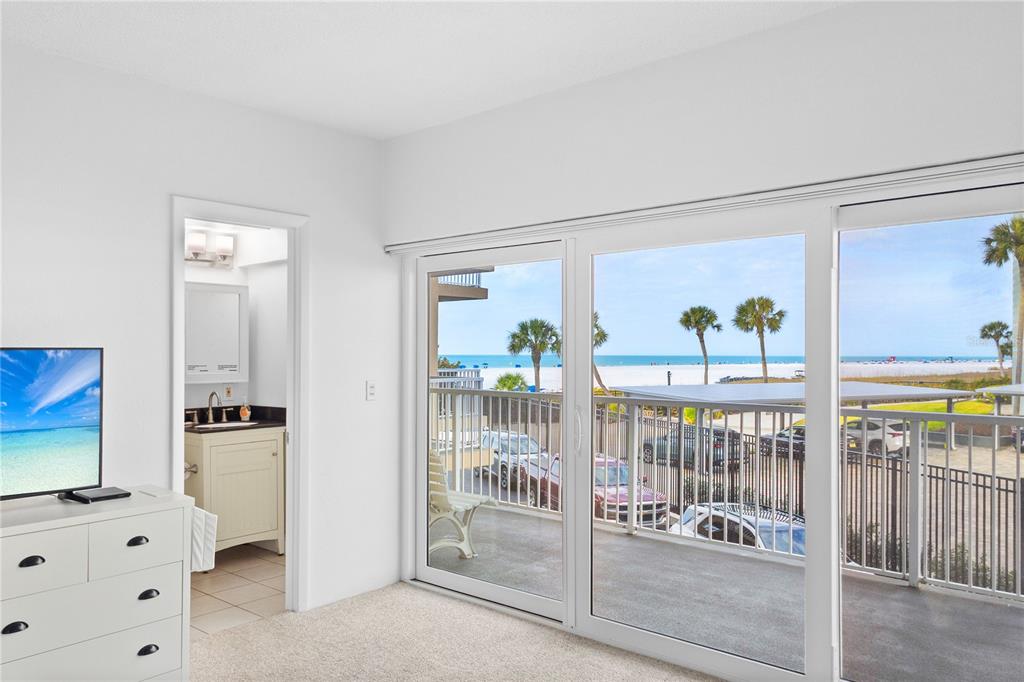 5830 Midnight Pass Road, Unit T22 Sarasota, FL 34242 - Photo 11 of 65 a view of a livingroom with wooden floor