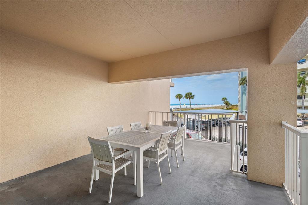 5830 Midnight Pass Road, Unit T22 Sarasota, FL 34242 - Photo 24 of 65 a table and chairs in a room