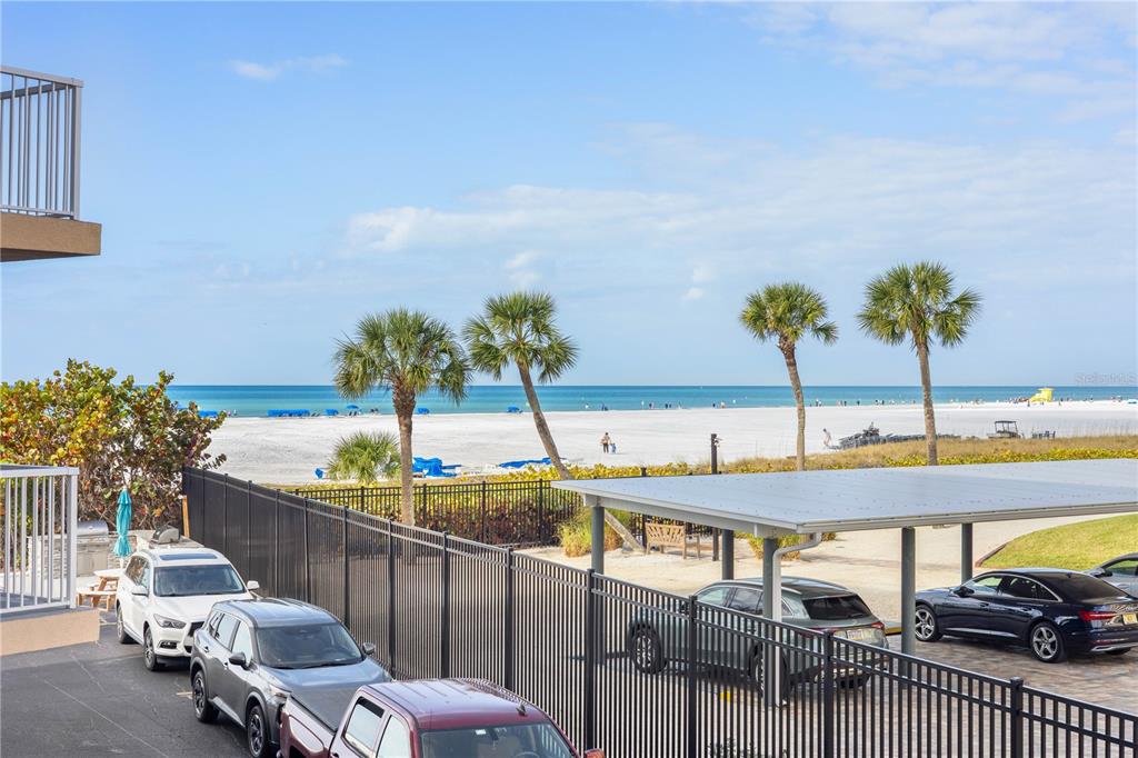 5830 Midnight Pass Road, Unit T22 Sarasota, FL 34242 - Photo 26 of 65 a view of a balcony with furniture
