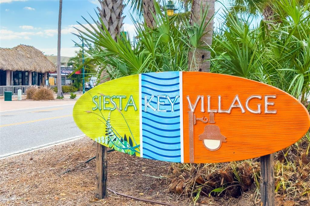 5830 Midnight Pass Road, Unit T22 Sarasota, FL 34242 - Photo 54 of 65 a view of a street sign