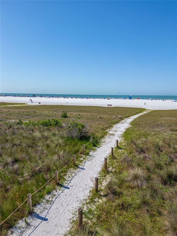 5830 Midnight Pass Road, Unit T22 Sarasota, FL 34242 - Photo 65 of 65 a view of an ocean and beach