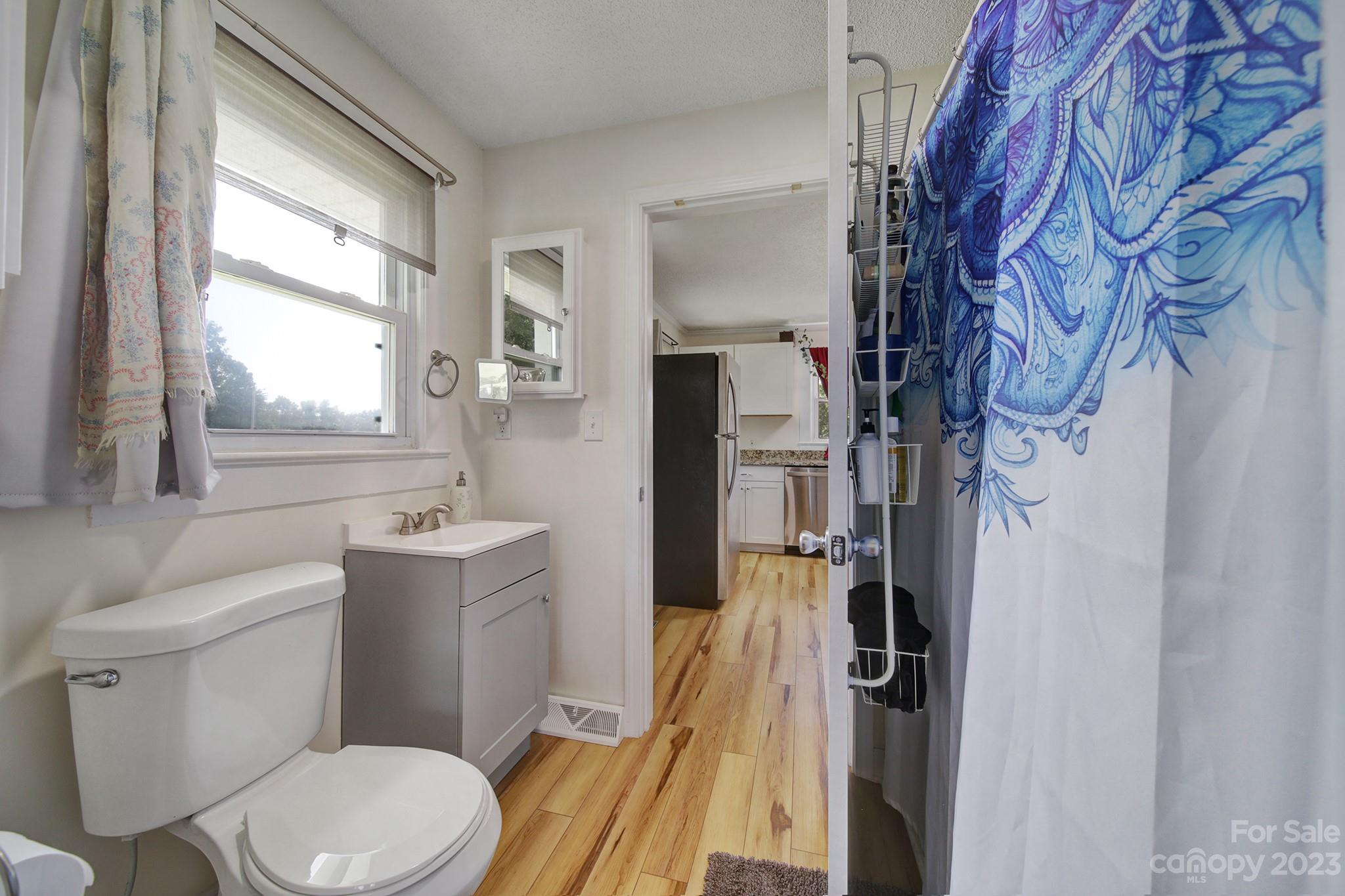 355 Walker Road Mount Pleasant, NC 28124 - Photo 14 of 33 a bathroom with a sink toilet and window