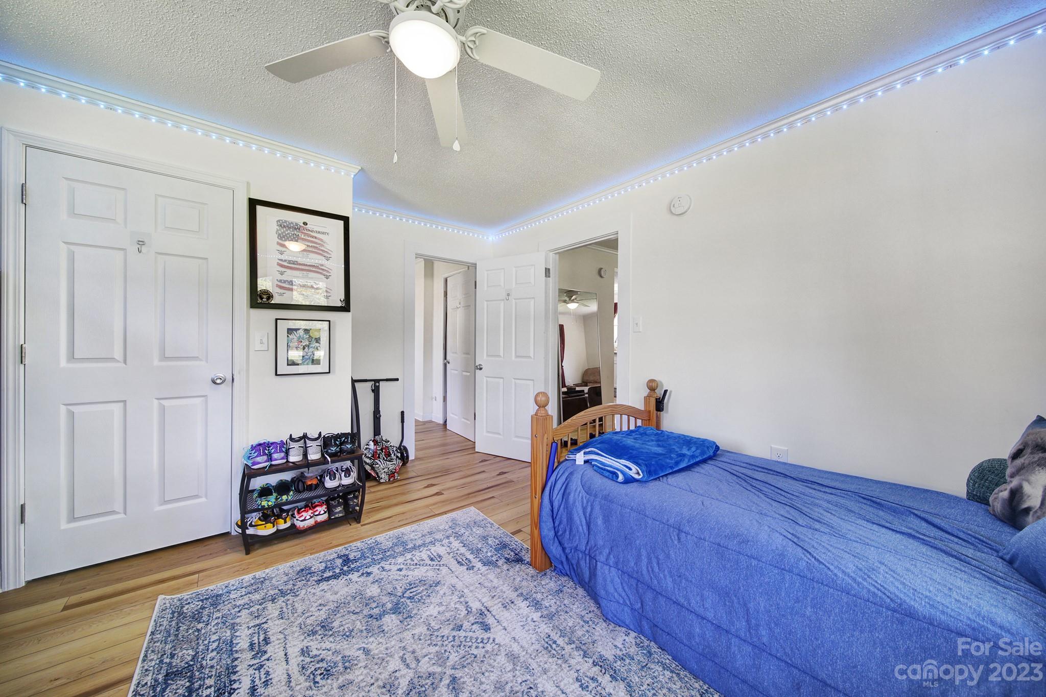 355 Walker Road Mount Pleasant, NC 28124 - Photo 17 of 33 a bed room with a bed and a chair