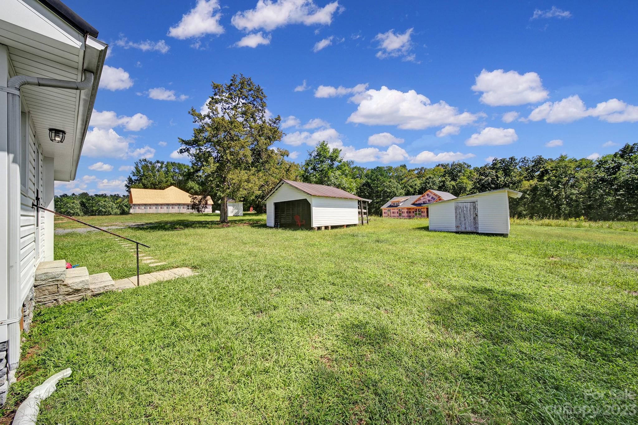 355 Walker Road Mount Pleasant, NC 28124 - Photo 19 of 33 a view of a house with a yard