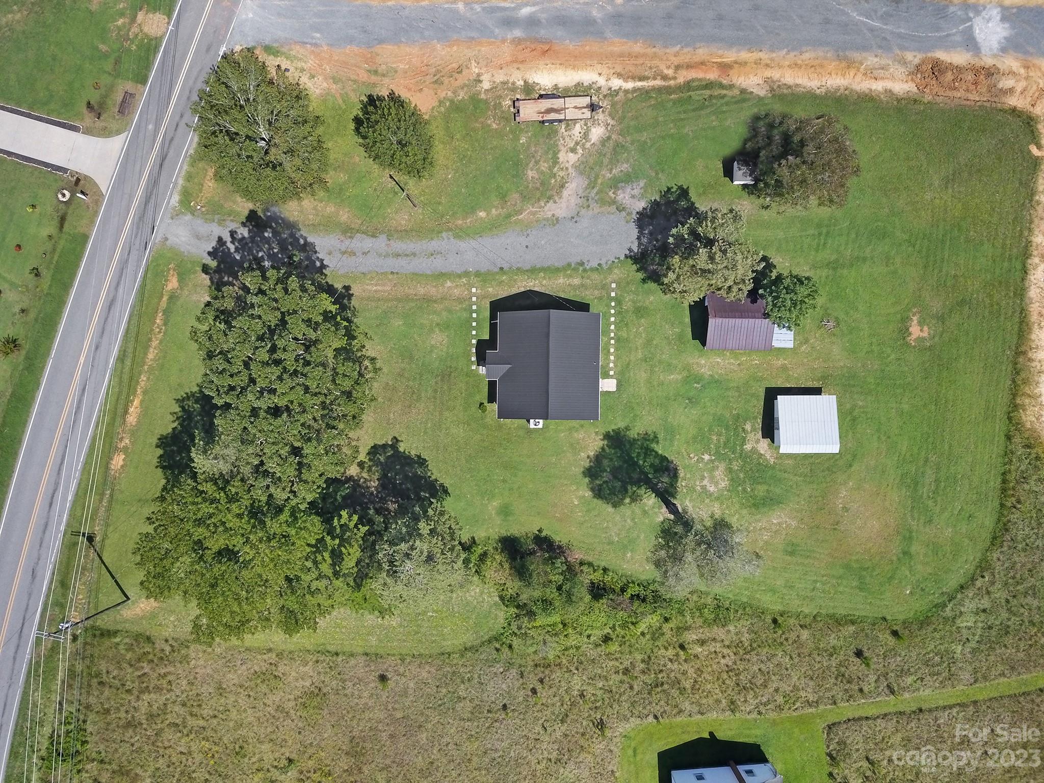355 Walker Road Mount Pleasant, NC 28124 - Photo 23 of 33 an aerial view of a residential houses with outdoor space