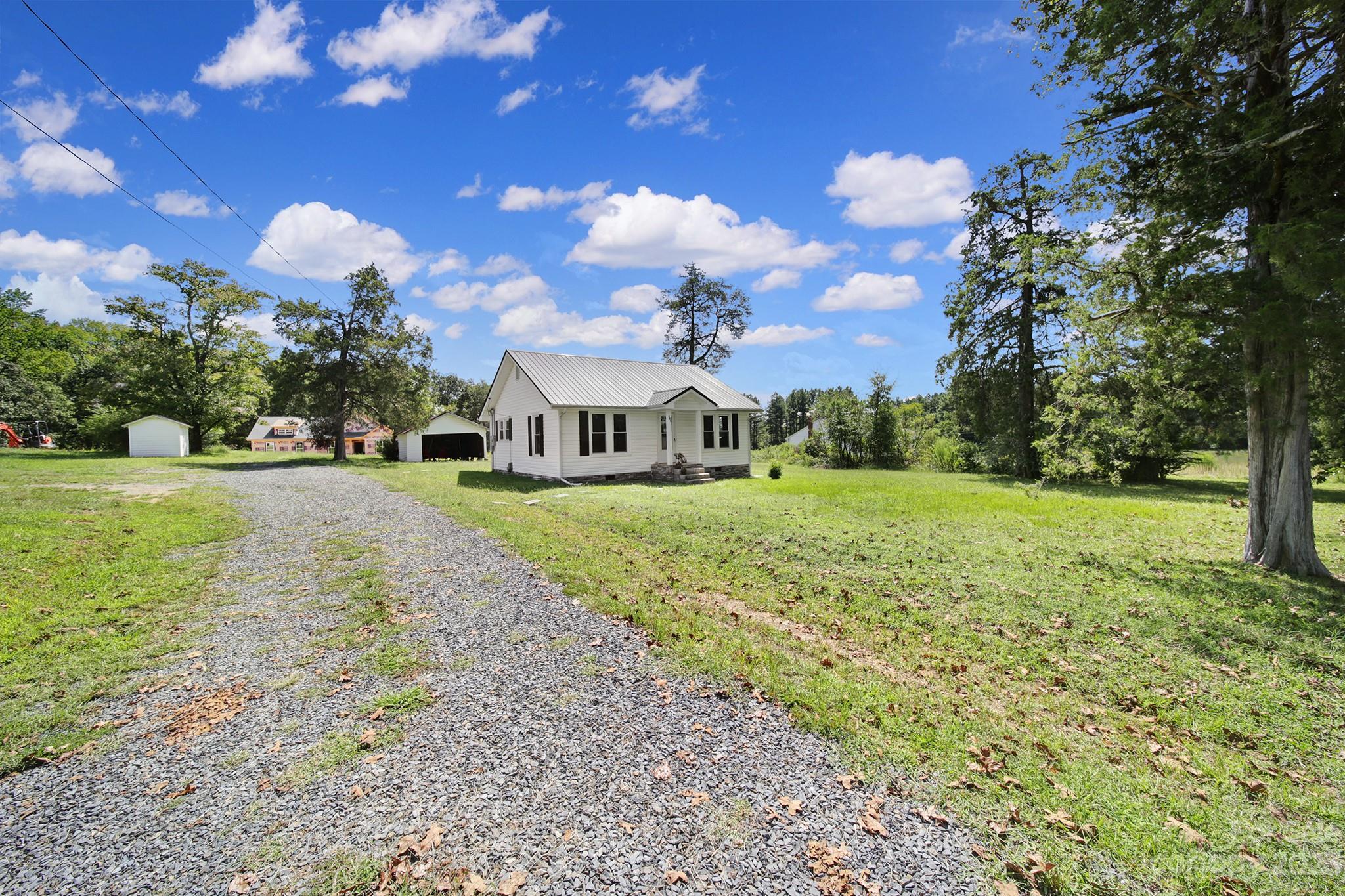 355 Walker Road Mount Pleasant, NC 28124 - Photo 29 of 33 a view of a house with a yard