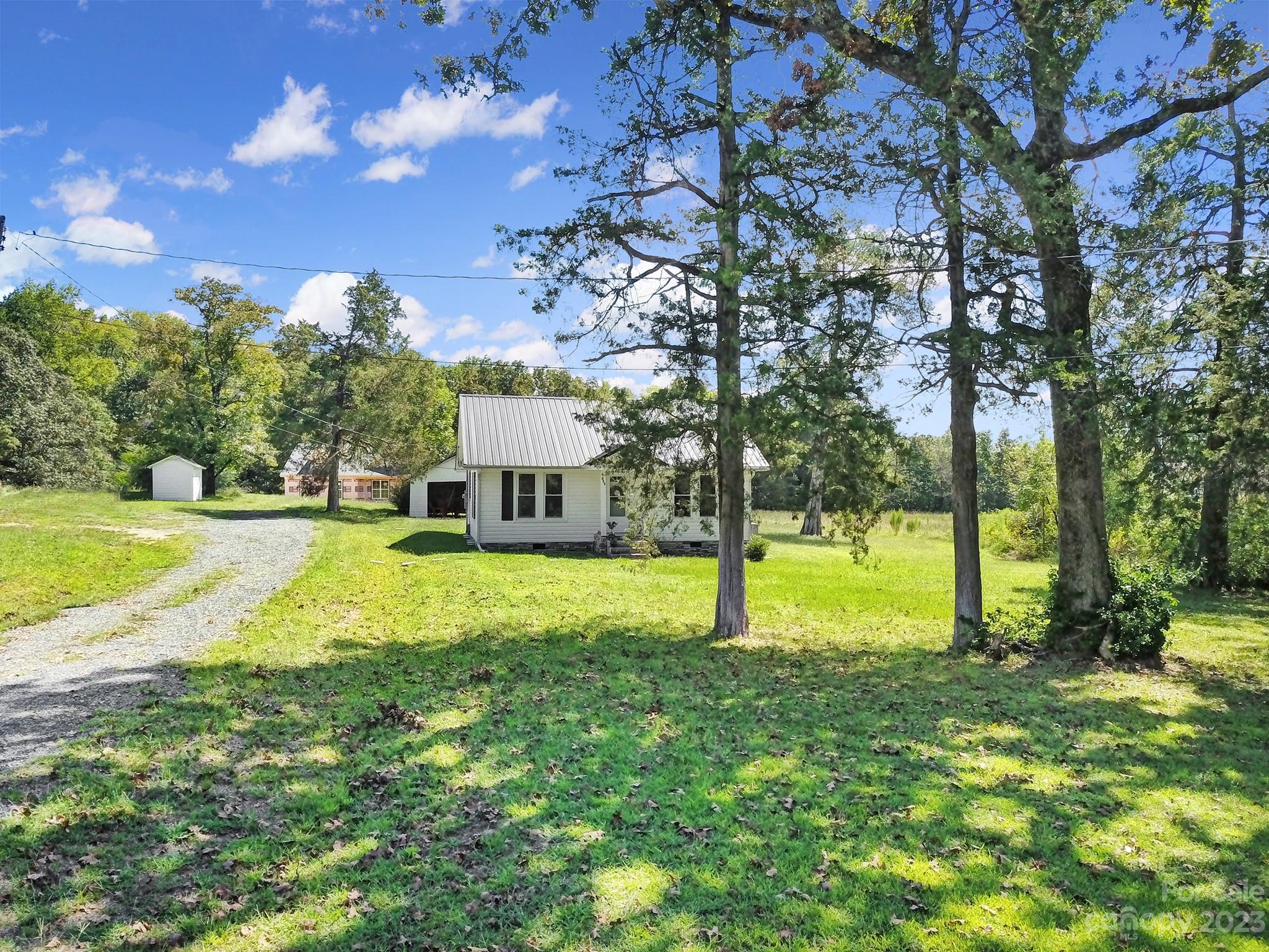 355 Walker Road Mount Pleasant, NC 28124 - Photo 32 of 33 a view of a house with a yard
