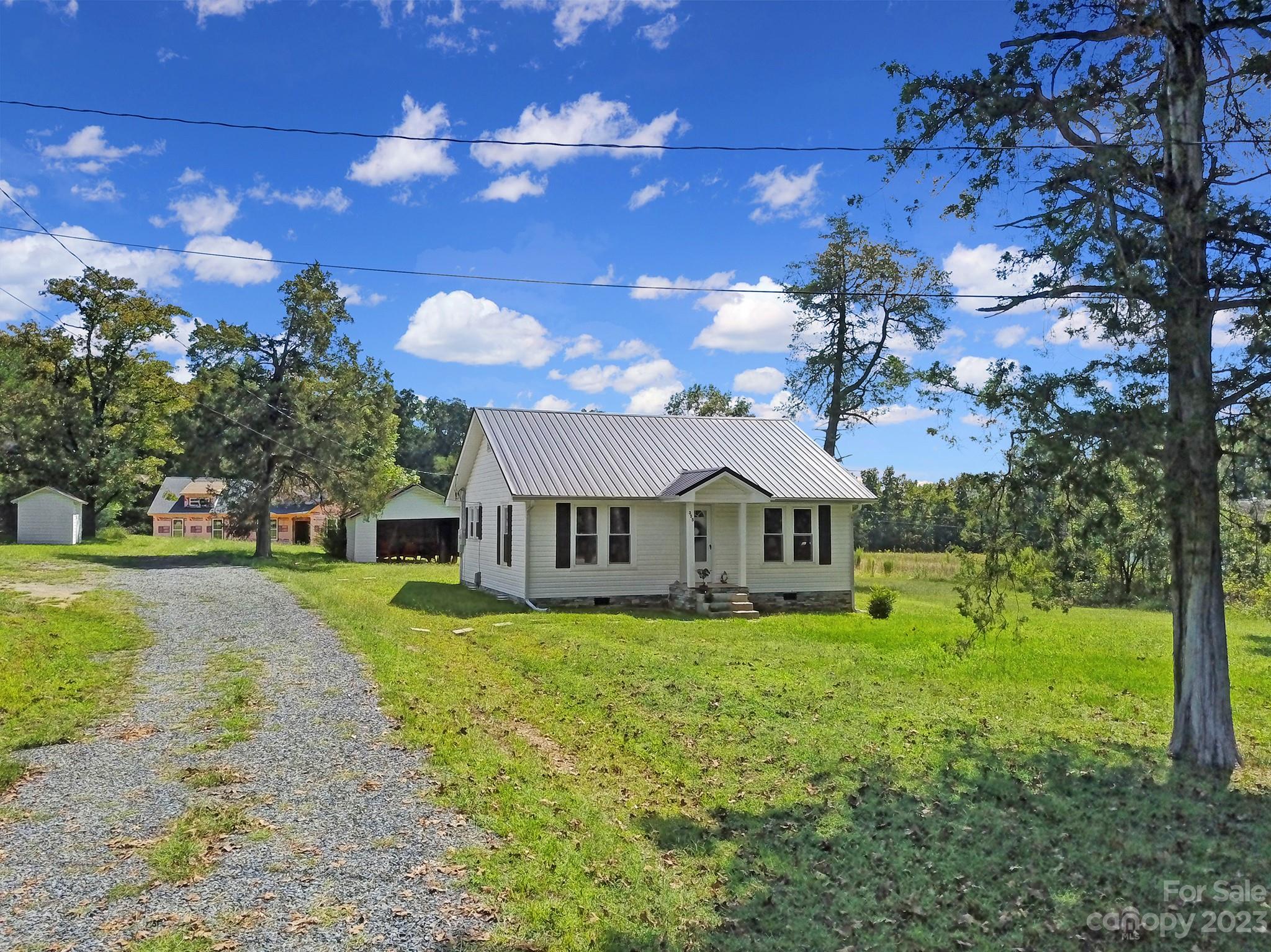 355 Walker Road Mount Pleasant, NC 28124 - Photo 33 of 33 a front view of house with yard and green space
