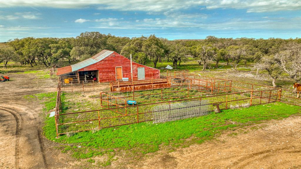 2975 North Fm 1702 Hamilton, TX 76531 - Photo 26 of 35 a view of a lake with a house in the background