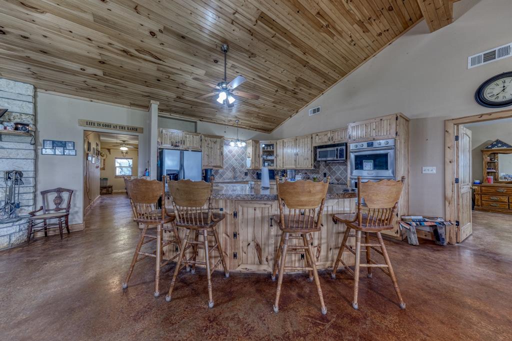 2975 North Fm 1702 Hamilton, TX 76531 - Photo 5 of 35 a view of a dining room with furniture window and wooden floor