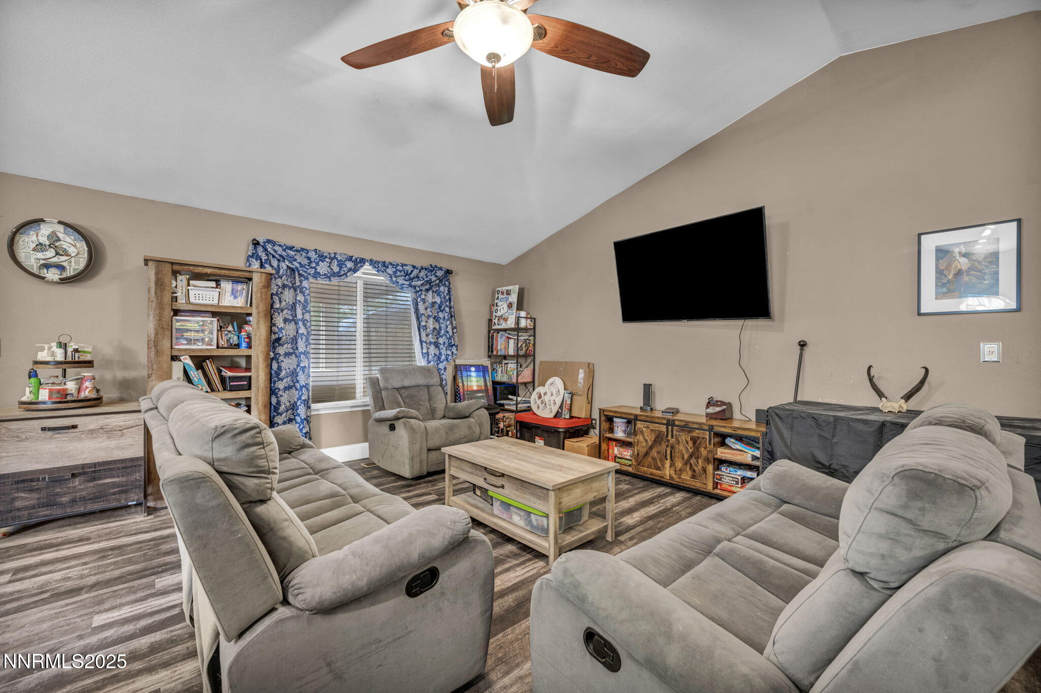 572 Spur Way Fernley, NV 89408 - Photo 15 of 48 a living room with furniture and a flat screen tv