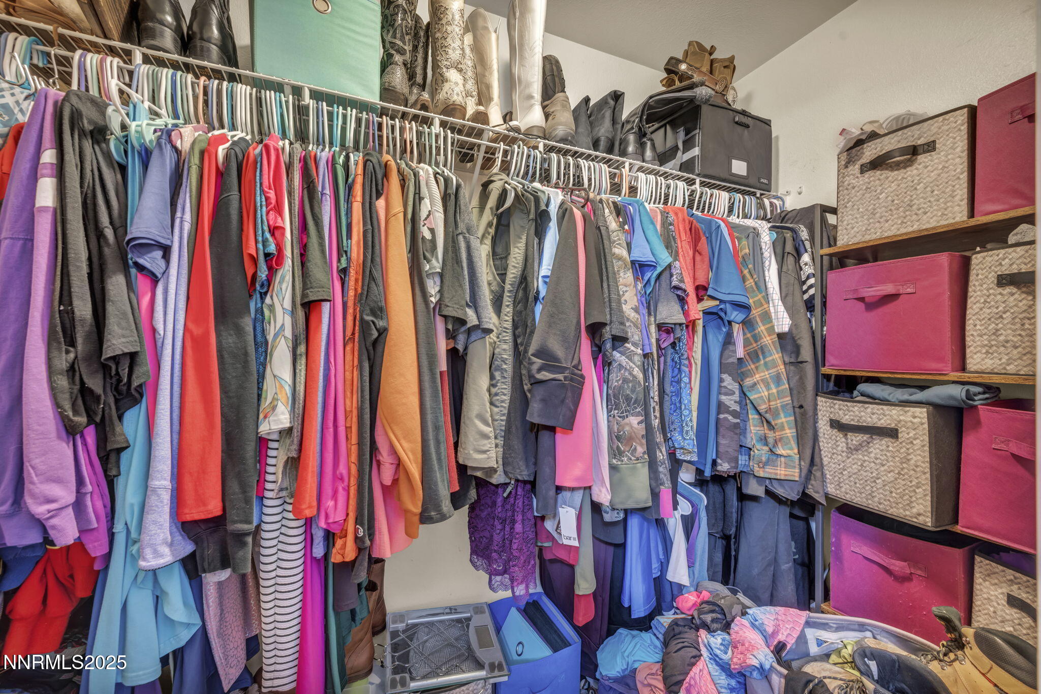 572 Spur Way Fernley, NV 89408 - Photo 17 of 48 a view of walk in closet with clothes
