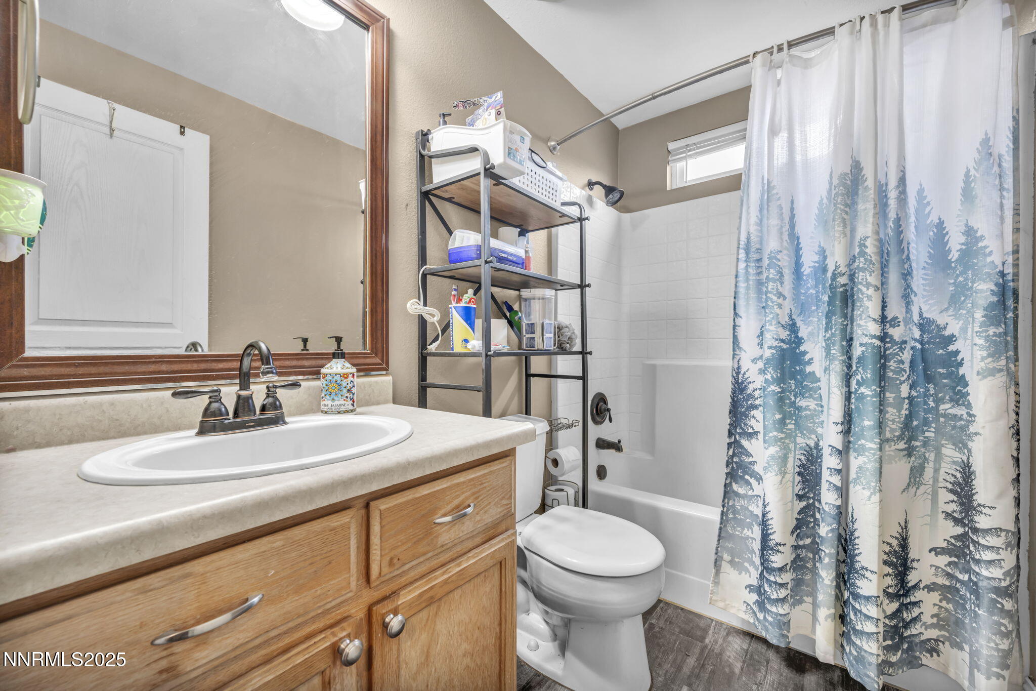 572 Spur Way Fernley, NV 89408 - Photo 21 of 48 a bathroom with a sink a toilet and shower